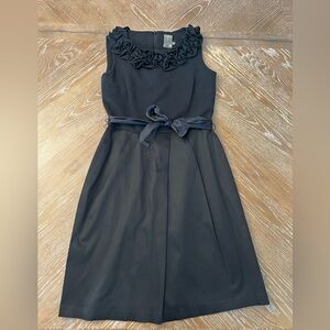 Taylor Black Sleeveless Dress with Ruffle Neckline